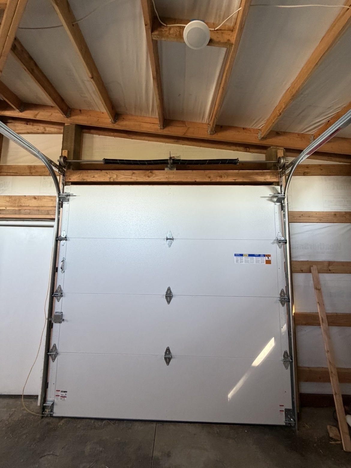 Heavy-duty steel garage door springs and mechanism